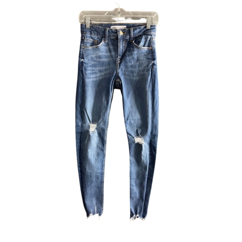 Zara women size 2 distressed knee skinny raw hem stretchy jeans. Style 6164/163